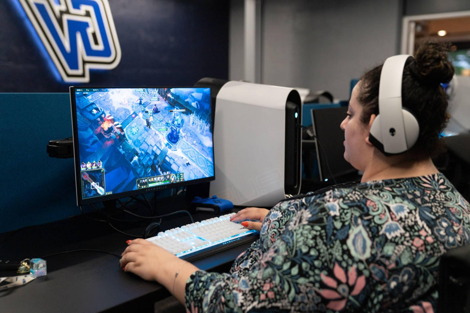 GVSU student playing League of Legends in the Laker Esports Center.